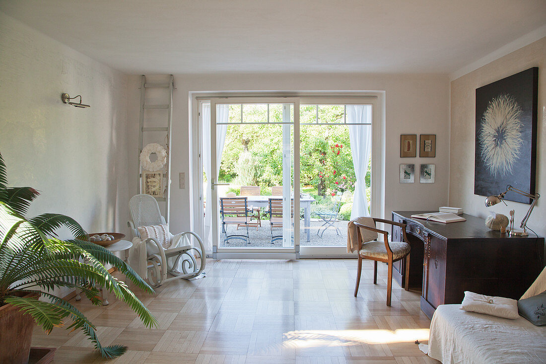 Rocking chair and desk in simple living room