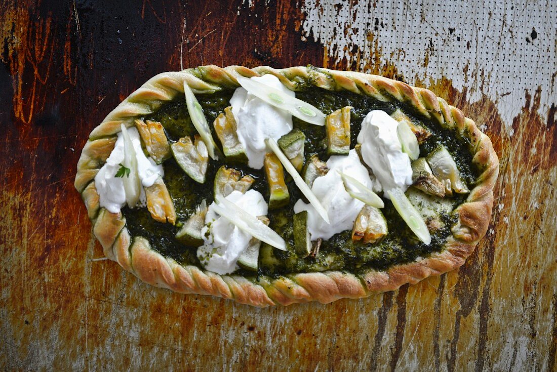 Courgette pie with pesto and cheese