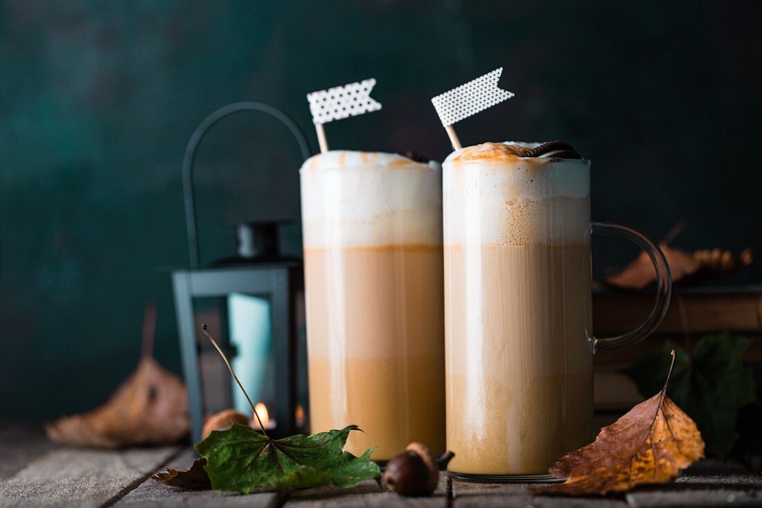 Caffe lattes with pumpkin puree, caramel and cream