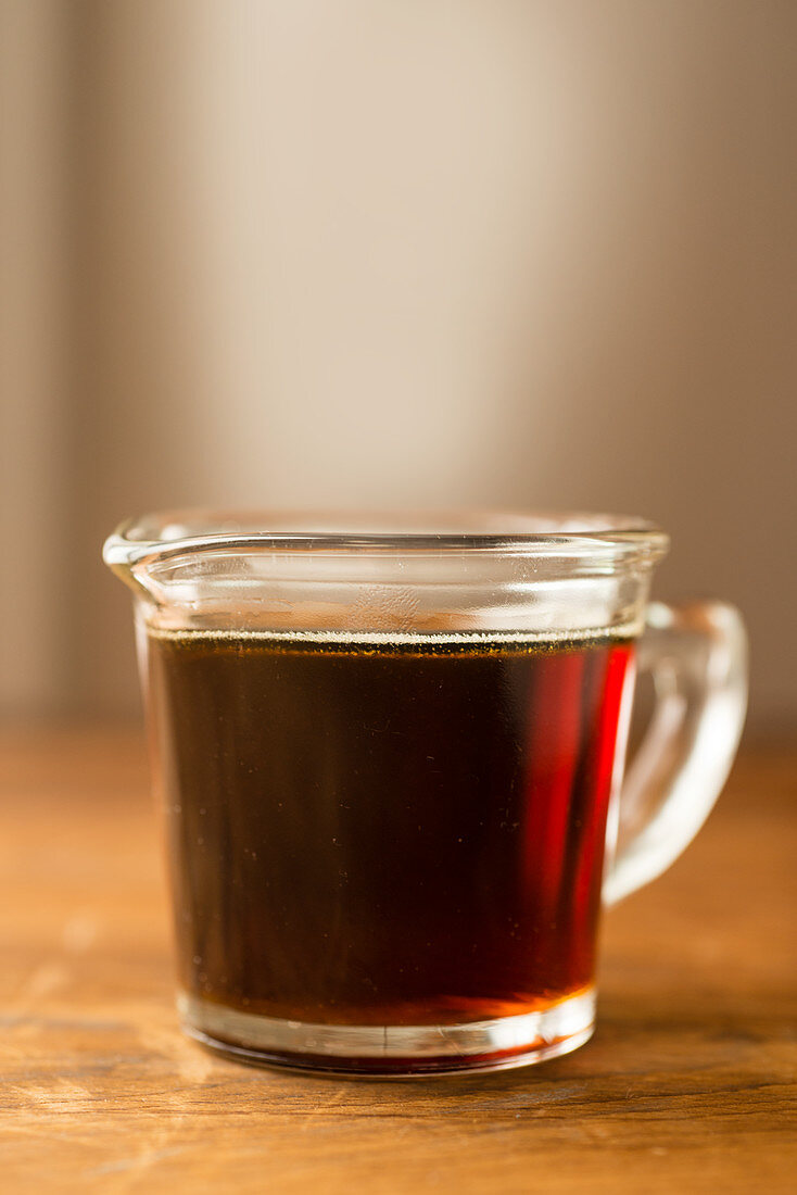 A glass of black coffee
