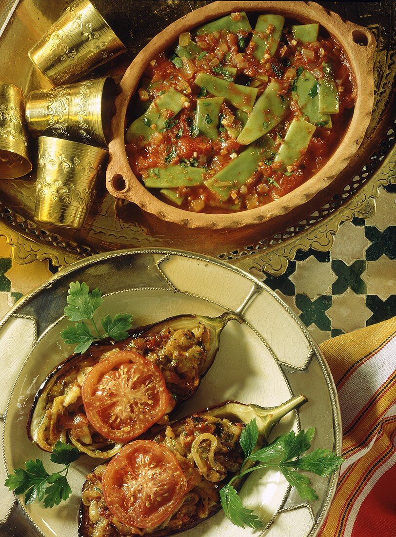 Green beans with tomatoes and stuffed aubergines