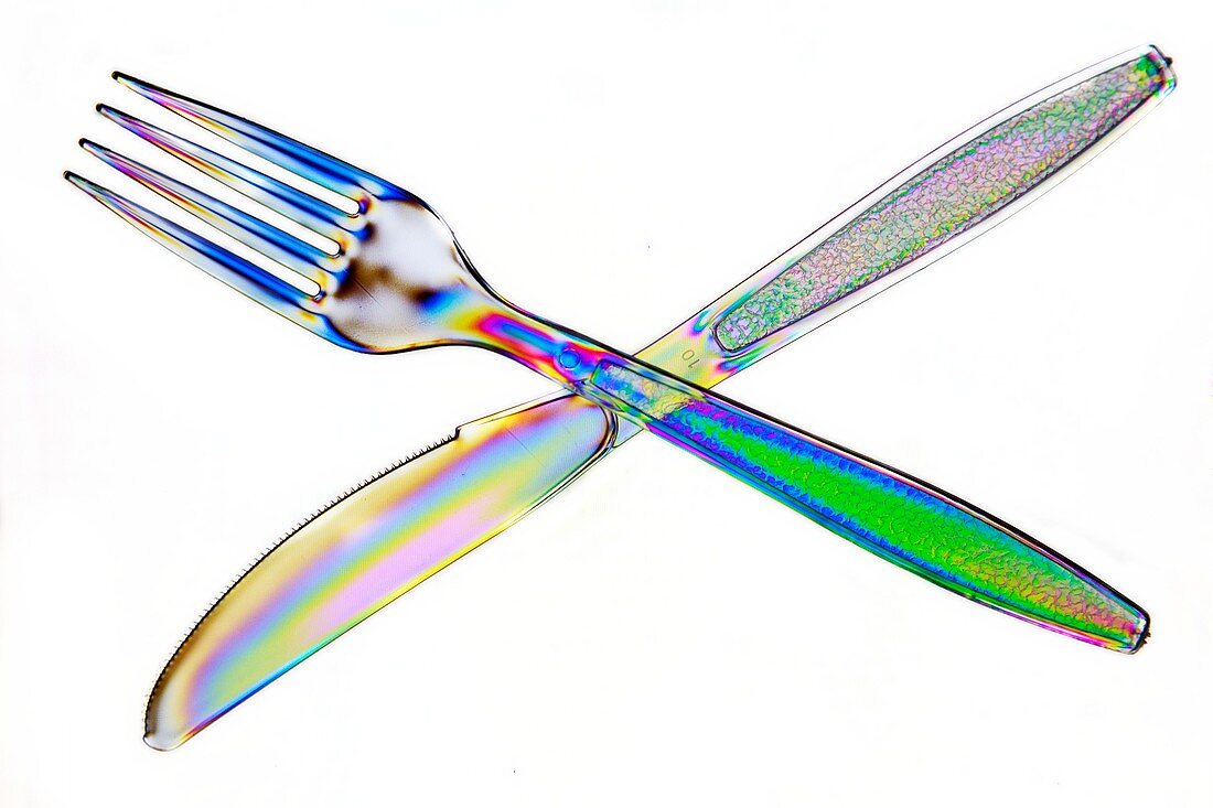 Plastic cutlery under polarised light
