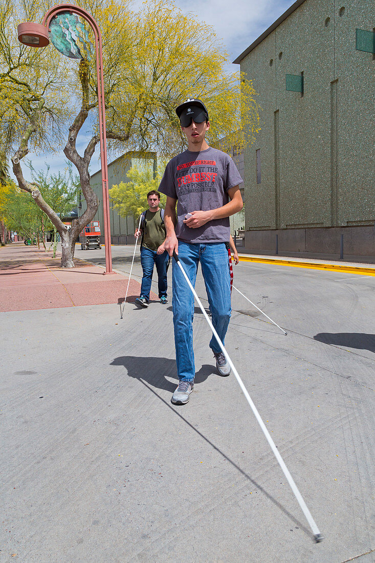 Practicing using white canes, USA