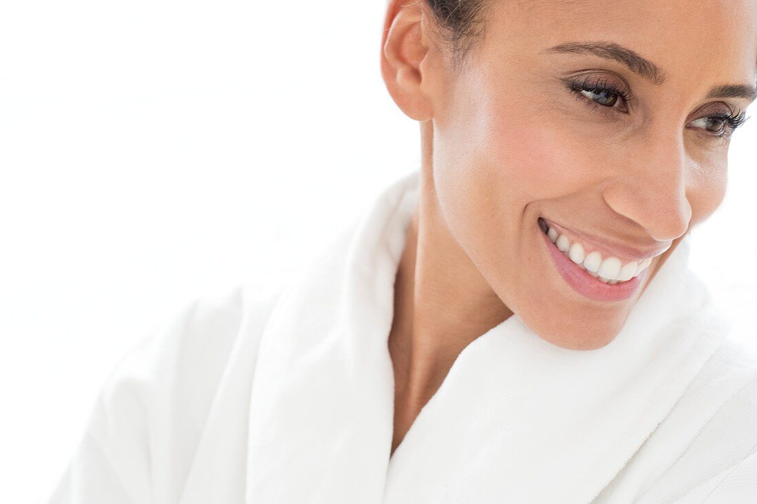 Woman smiling and looking away