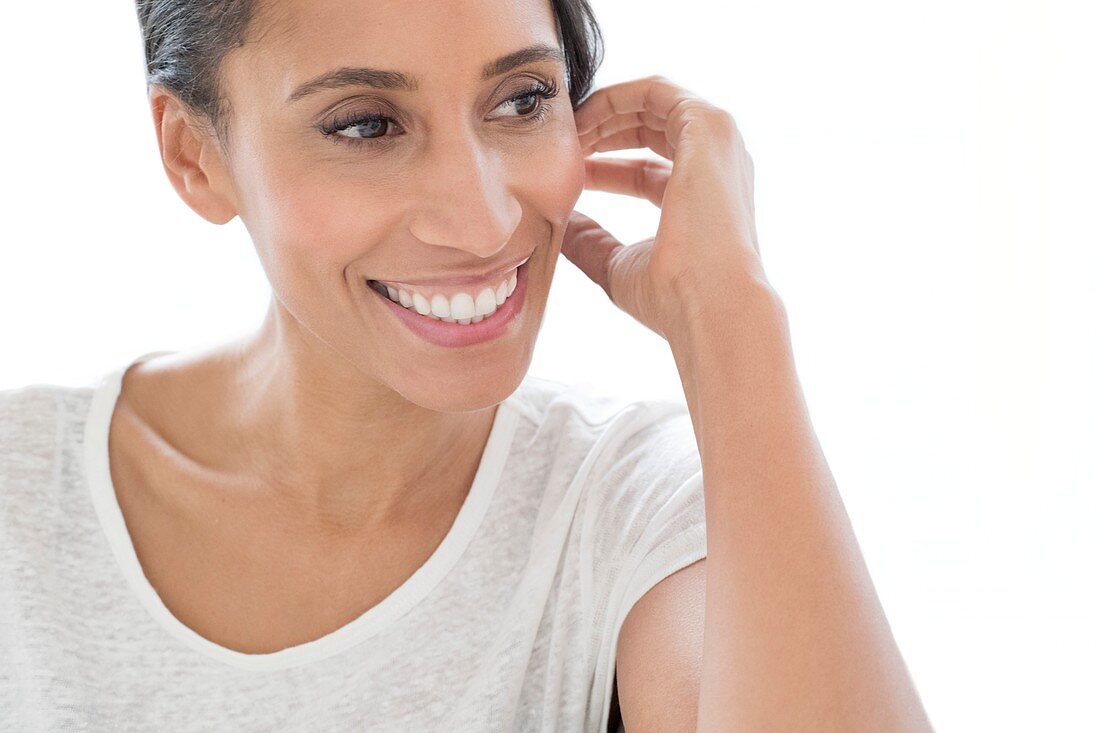 Woman smiling and looking away