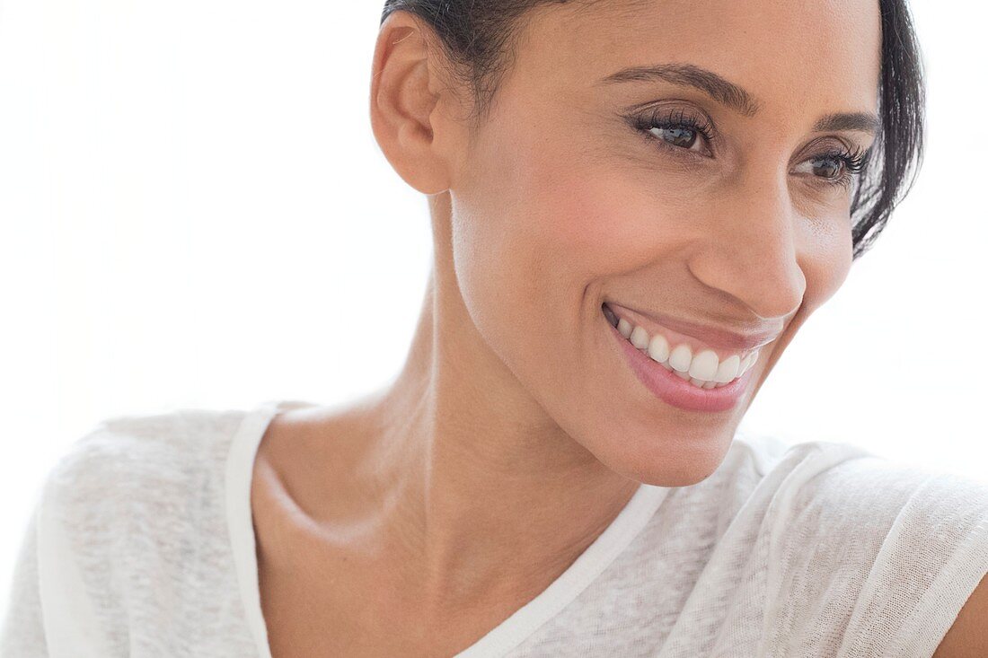 Woman smiling and looking away