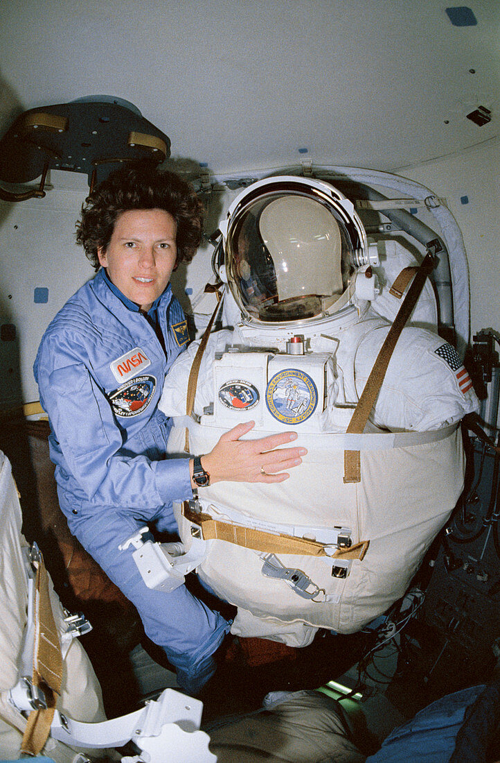 Astronaut Kathryn Sullivan with EMU spacesuit