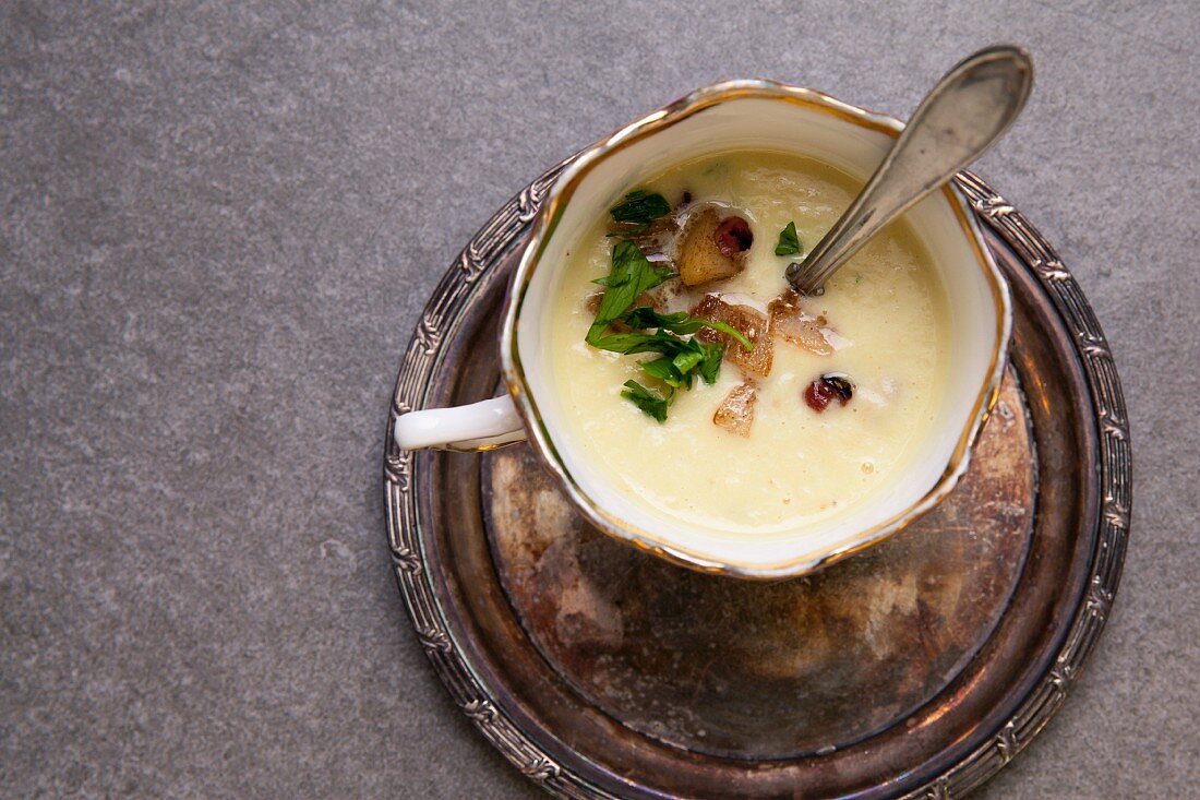 Celery soup with bacon and pear