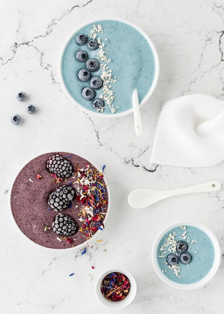 Bowls of blue and purple 'nice cream' (ice cream alternative)