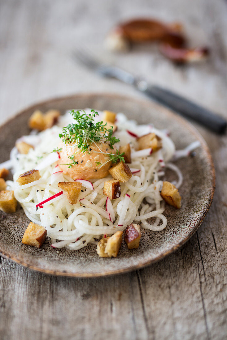 Radish noodles with Obatzter cheese spread and pretzel croutons