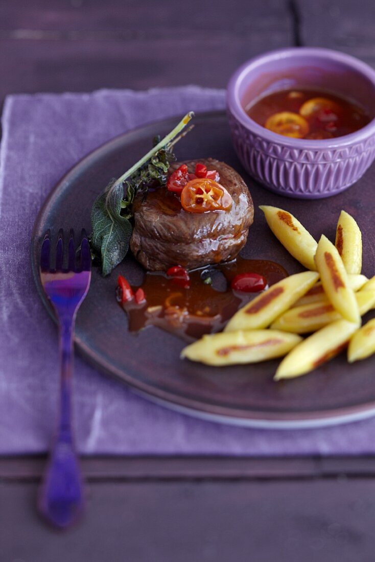 Fillet of fawn with rosehip and kumquat sauce and finger-shaped dumplings