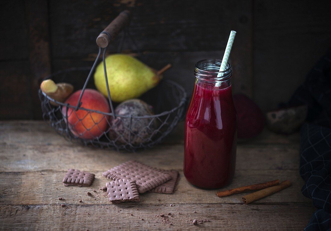 A beetroot smoothie with pear, peach, cinnamon and ginger