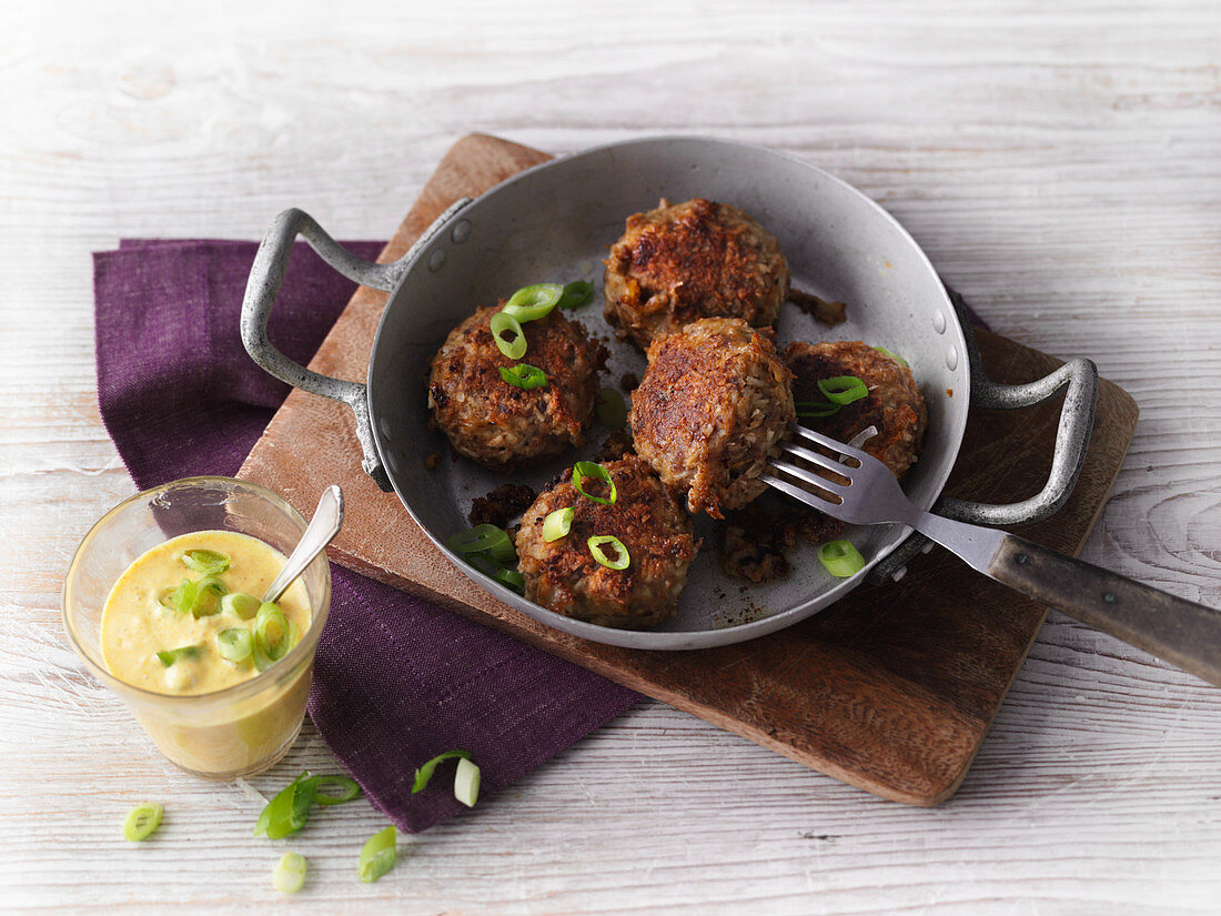 Indonesian coconut meatballs with mango sauce