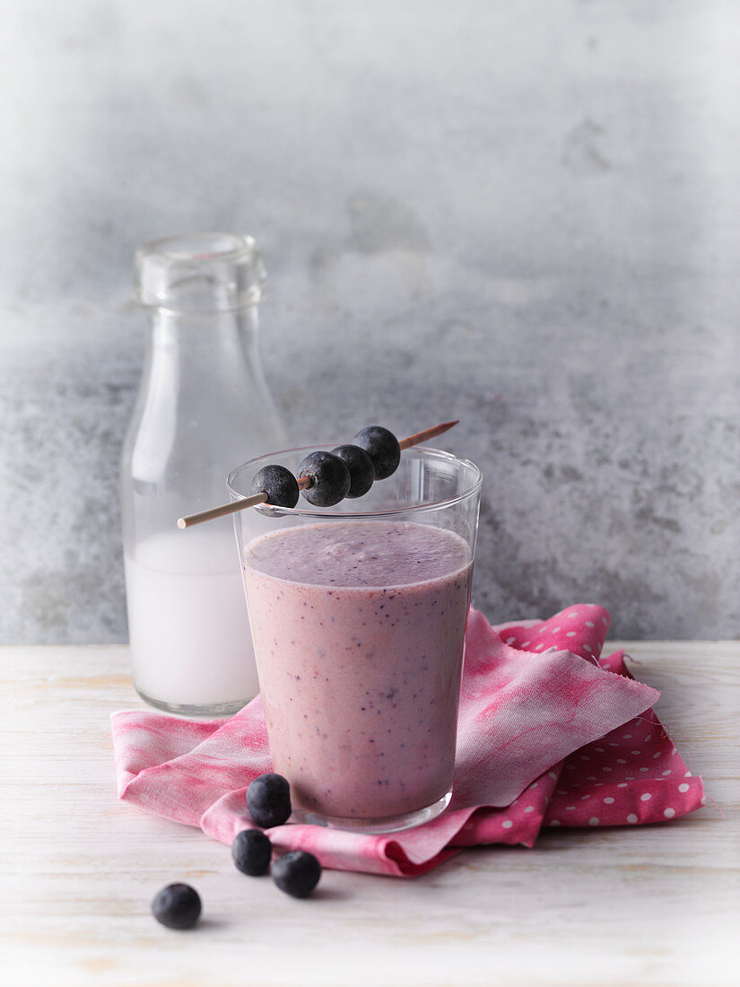 A blueberry and apple smoothie with coconut milk