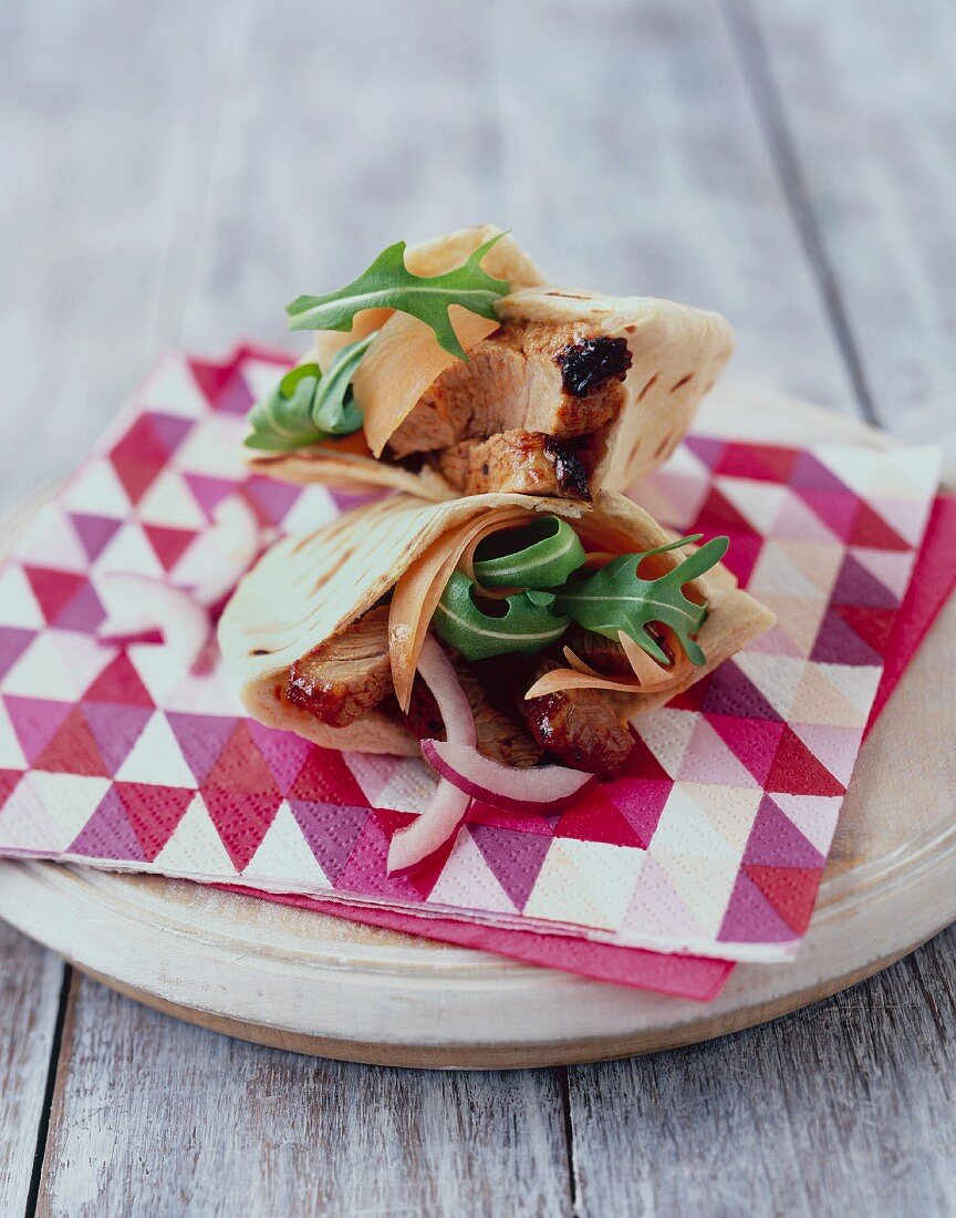 Pork and rocket wraps