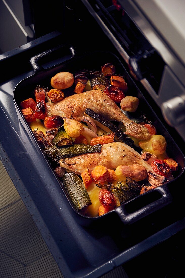 Chicken legs with vegetables fresh from the oven