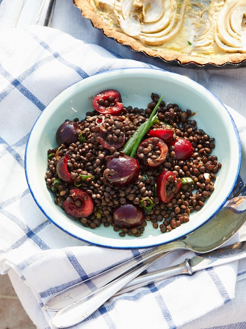 Black lentil salad with cherries