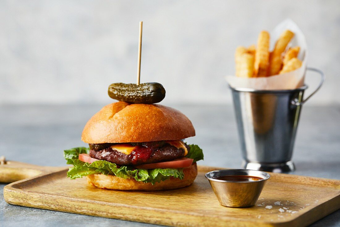 An Angus beef burger with fries