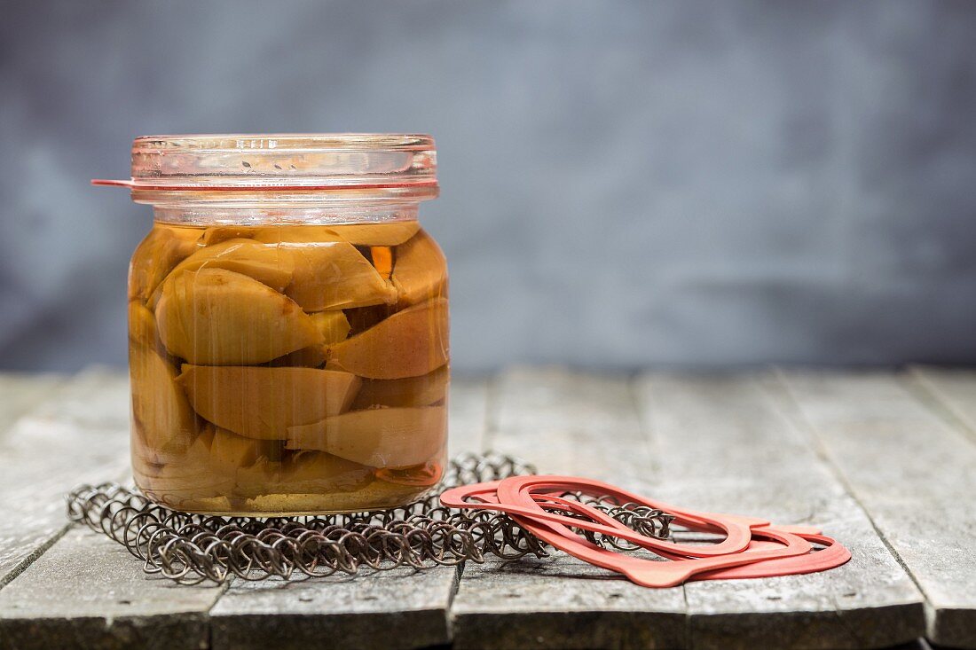 Preserved pears in a glass jar