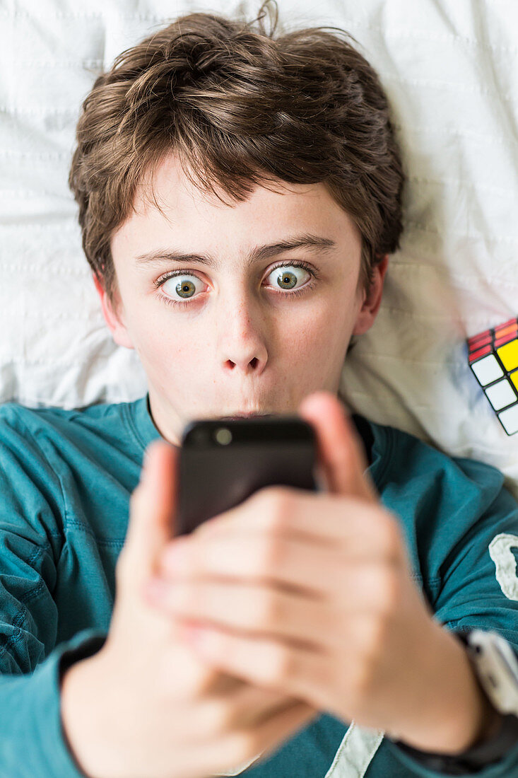 Teenage boy using a Smartphone