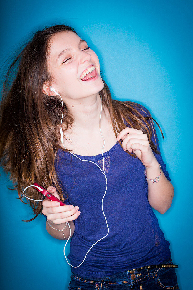 Adolescent listening to music