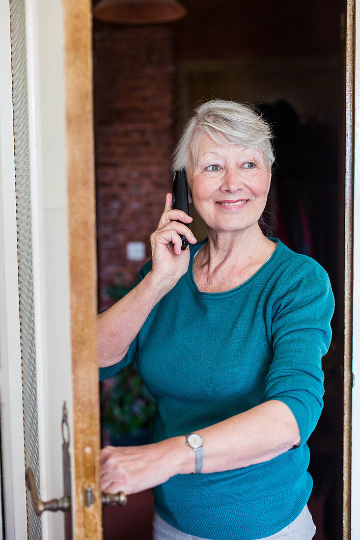 Senior woman talking on the telephone