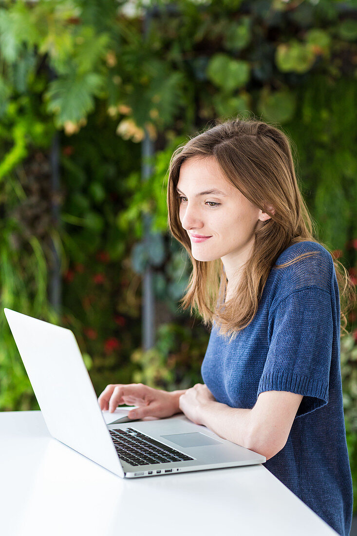 Woman using a laptop