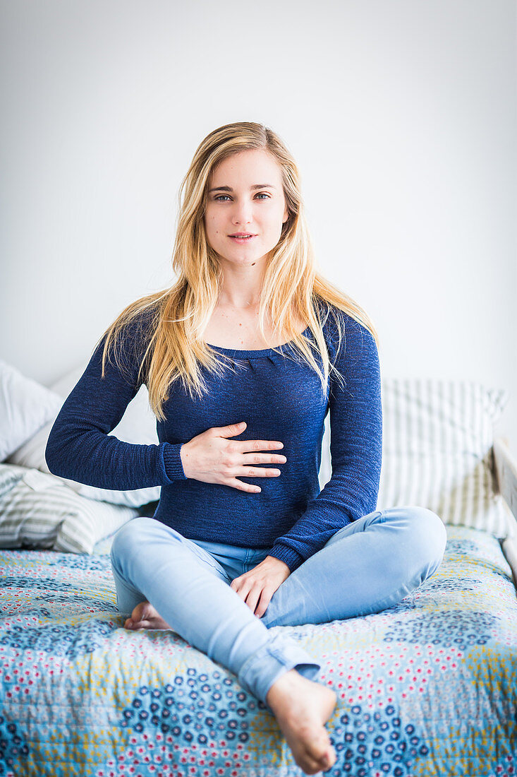 Woman doing breathing exercises