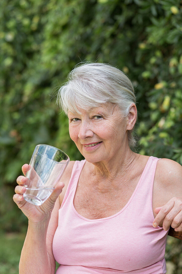 Woman drinking of glass of water