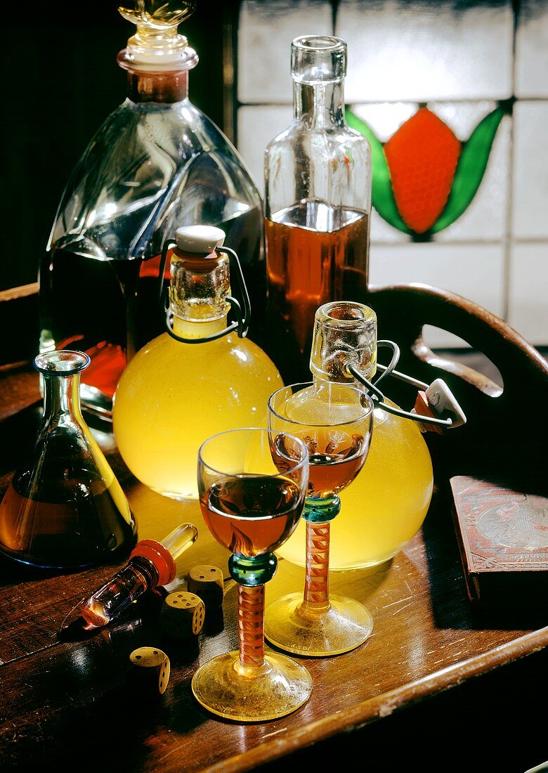 Still life with home-made liqueurs and schnapps