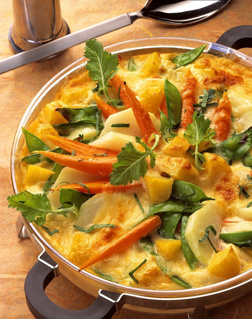 Vegetable casserole with carrots, potatoes, kohlrabi & sugar pods