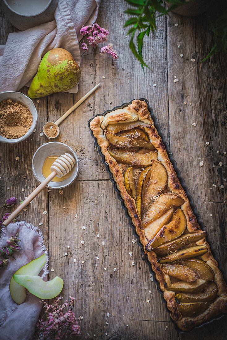 Rustic pears and almond cake in a rustic setting