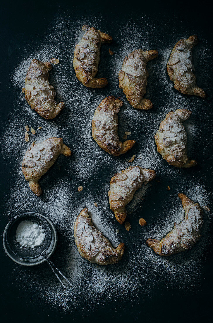 Almond Croissants in a dark background