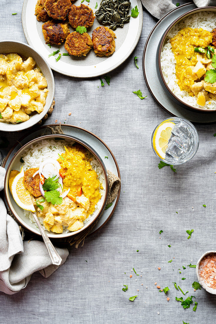 Rice with dal, potato curry and sesame fritters (India)