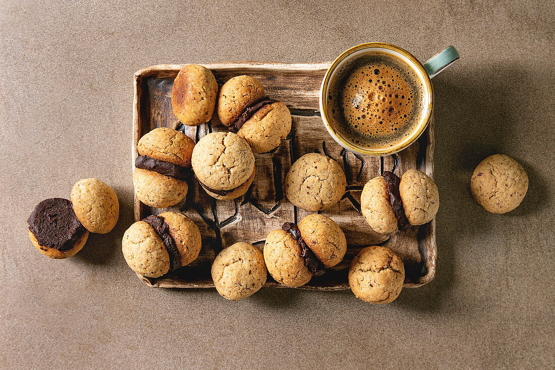 Baci di dama' homemade Italian hazelnut biscuits cookies with chocolate cream