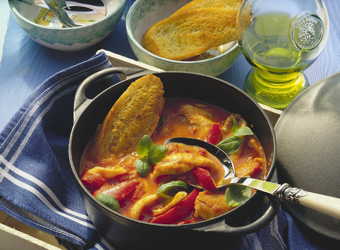 Sole and tomato ragout with basil and fried bread
