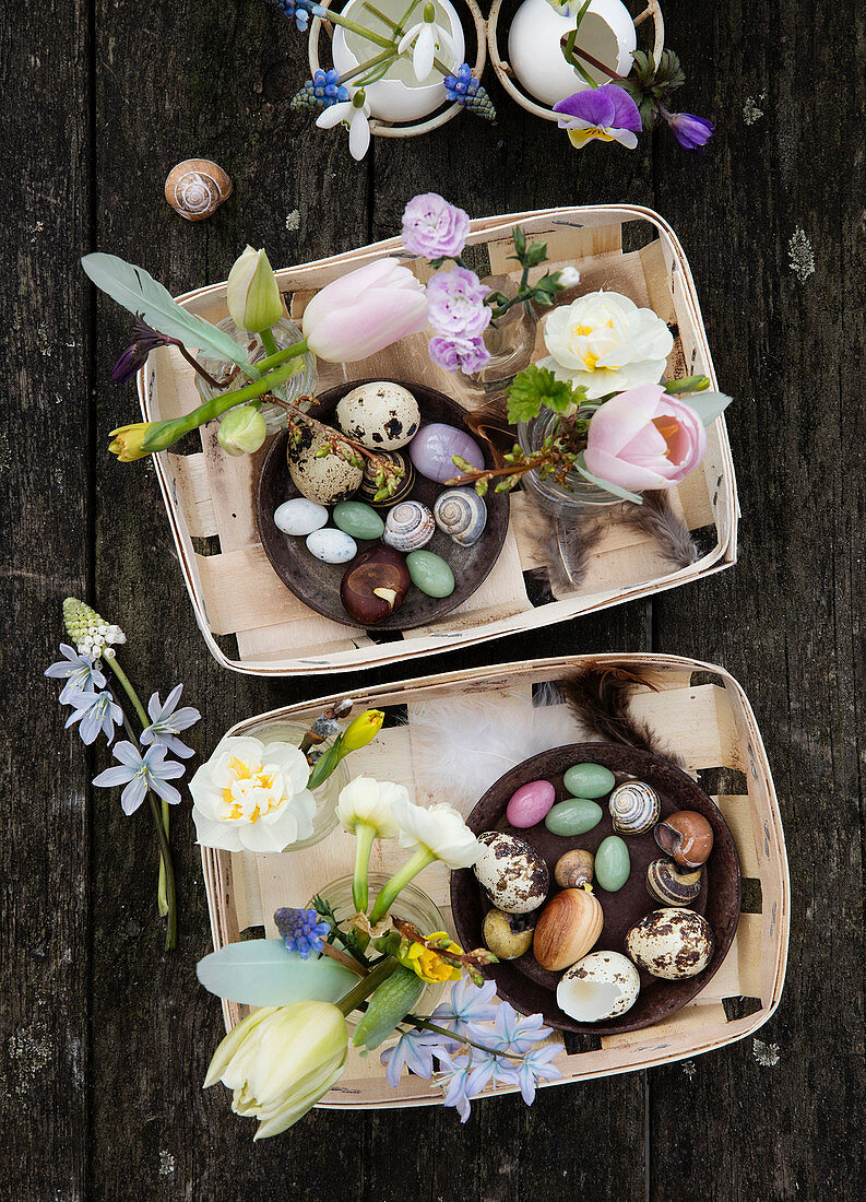Baskets with spring flowers, Easter eggs, and natural finds