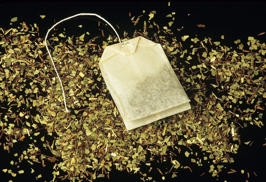 Mixed herb tea in tea bag and loose