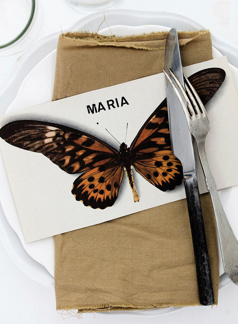 Card with butterfly motif and name as a place card