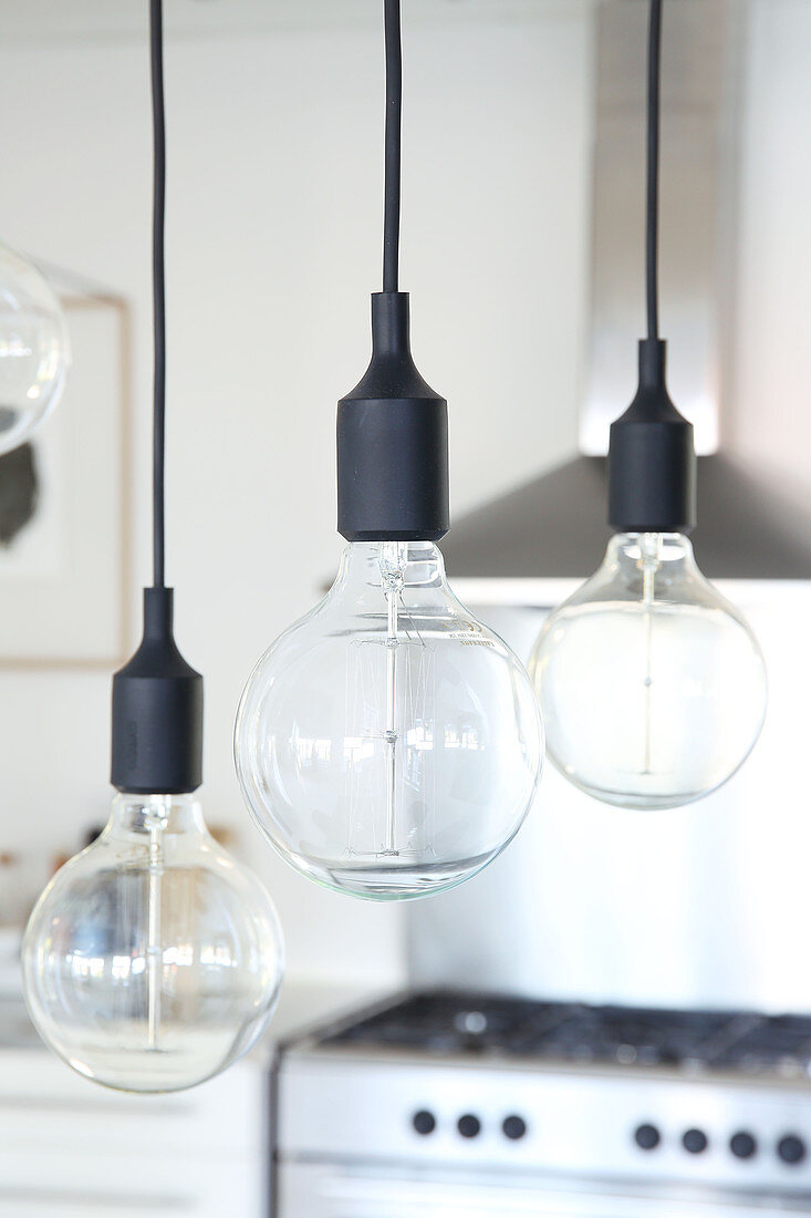 A pendant light above a dining table