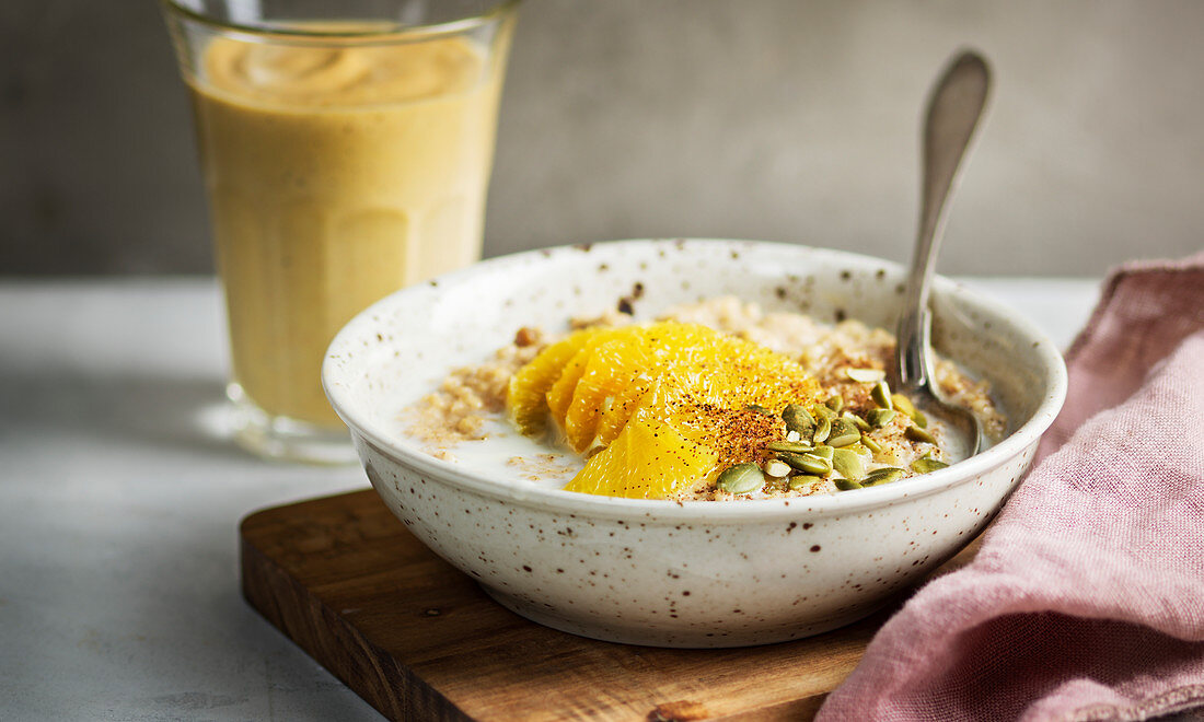 Porridge with oranges and pumpkin seeds