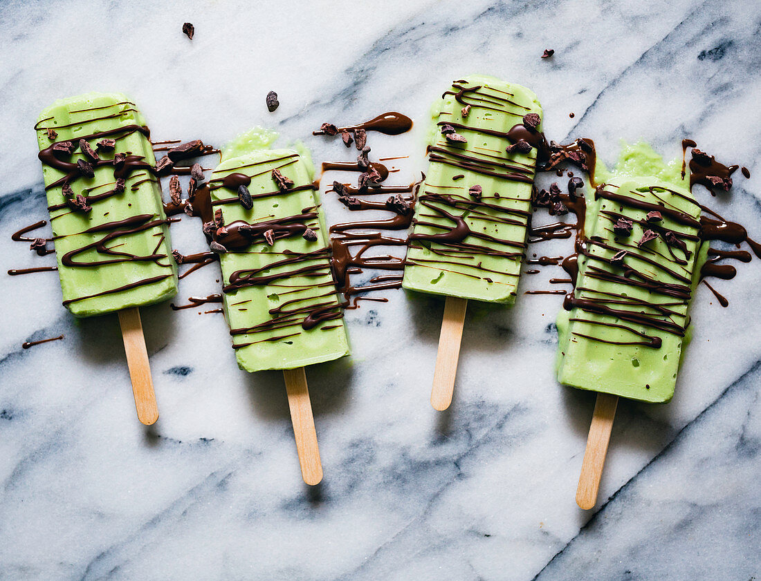 Avocado and lime ice lollies with chocolate drizzle
