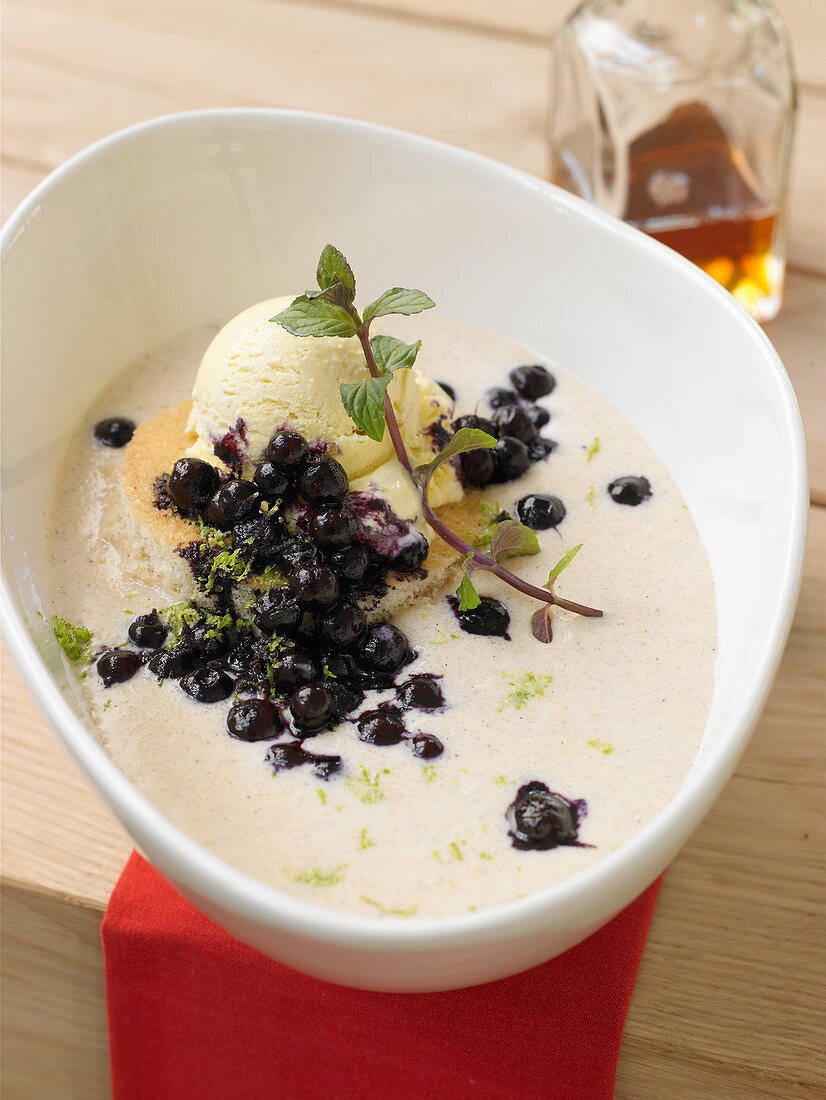 Semolina soup with blueberries and vanilla ice cream