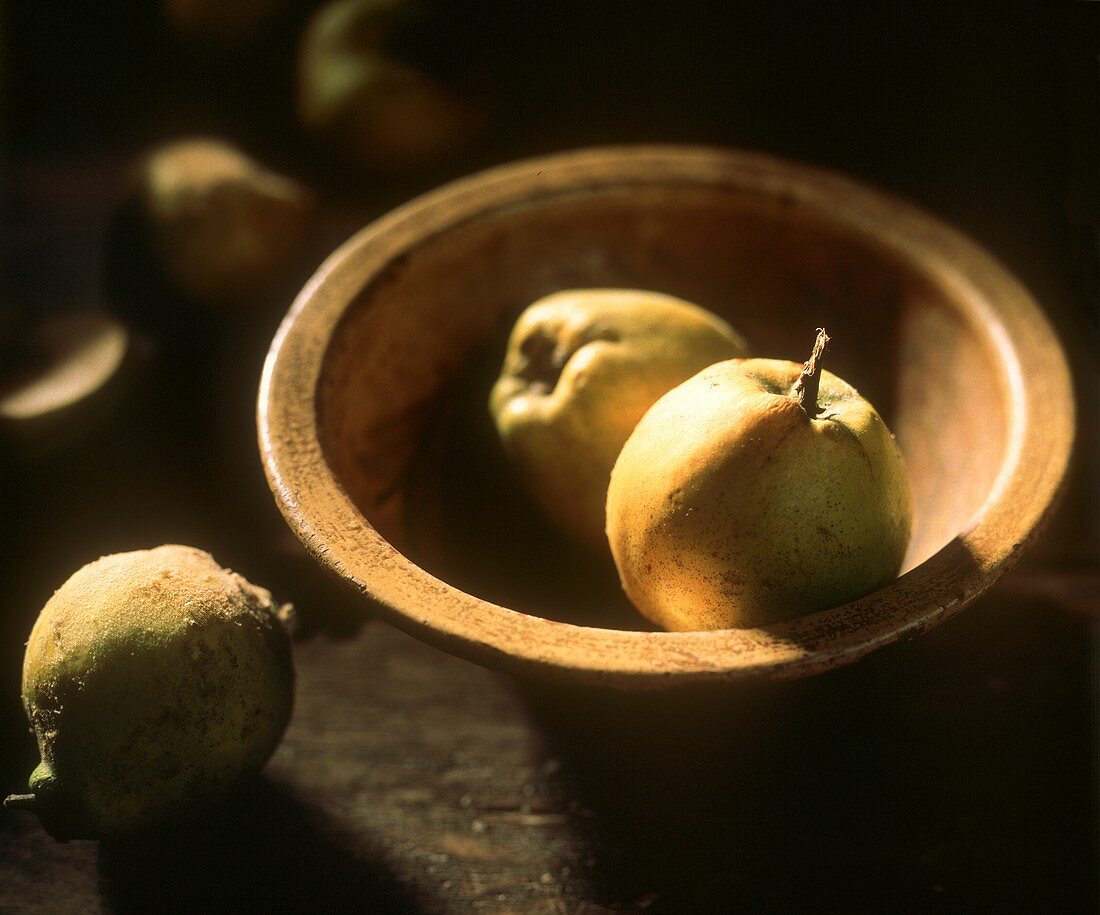 Quince in and Beside a Bowl