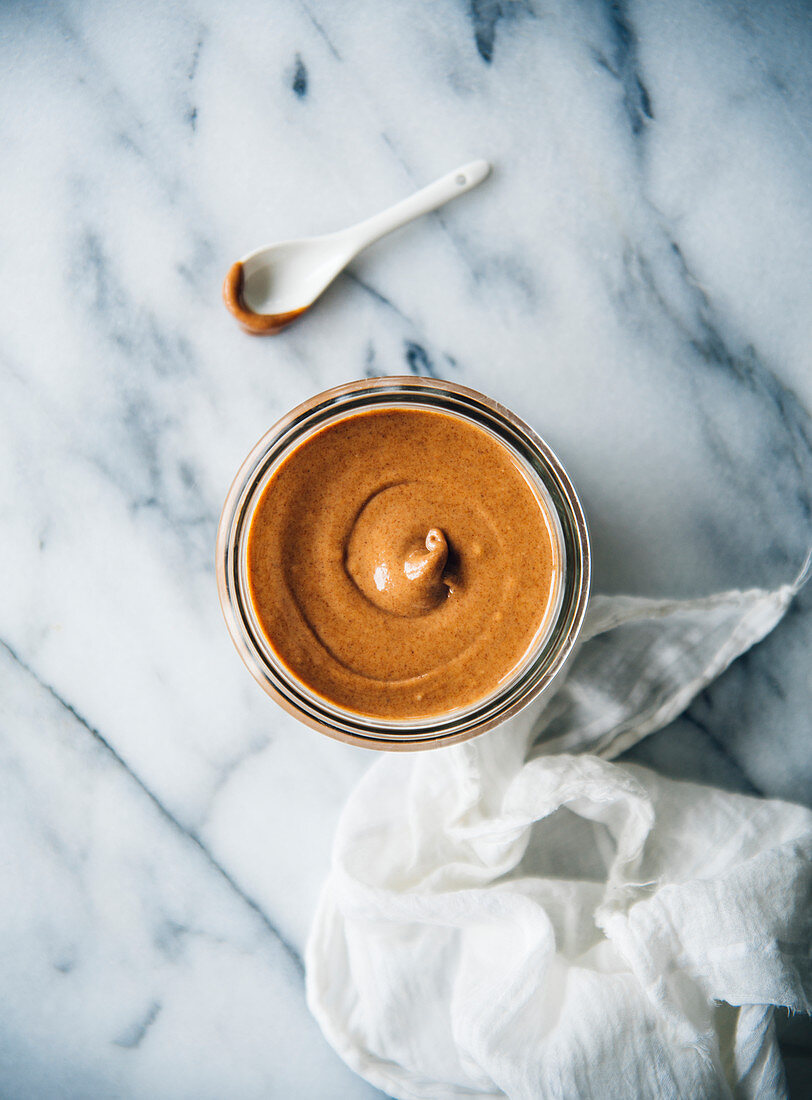 A brown smoothie in a glass