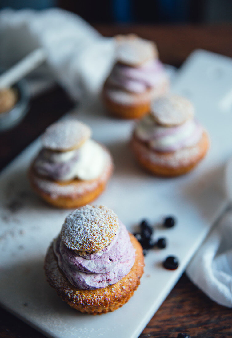 Cupcakes with blueberry cream