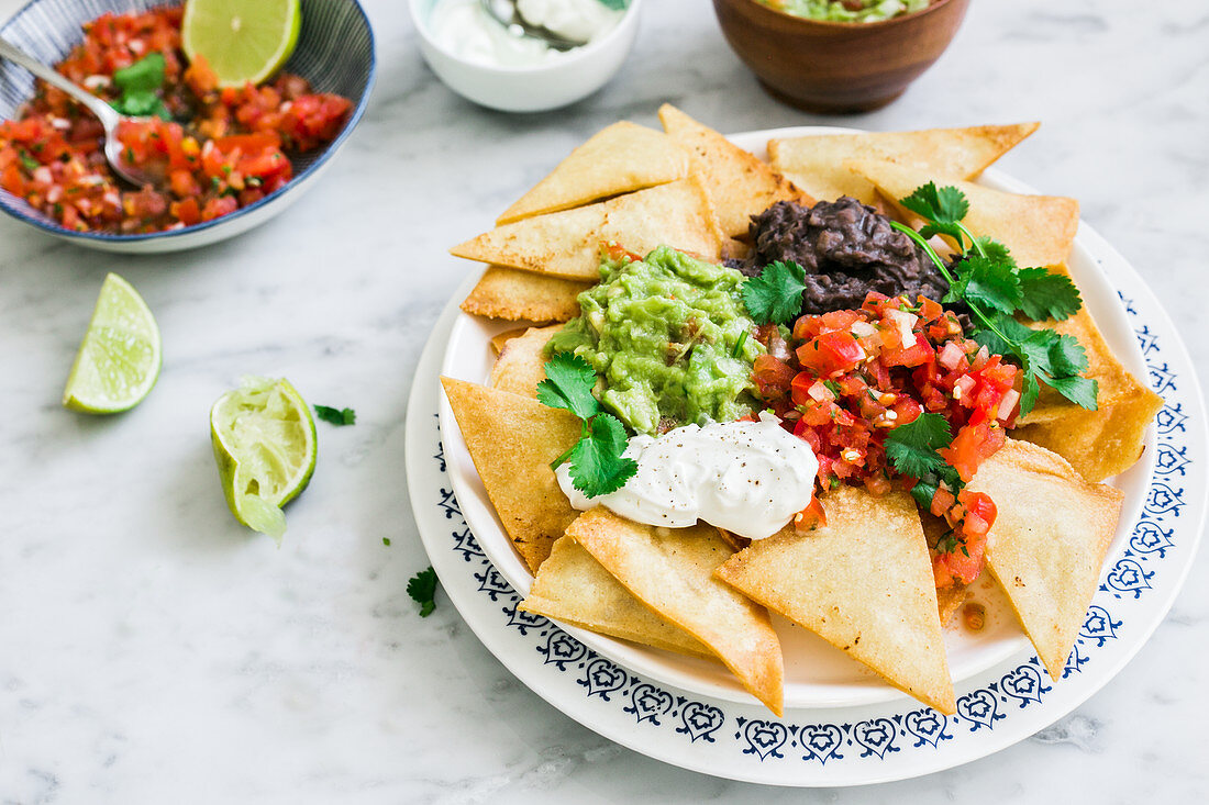 Mexican nachos with various toppings