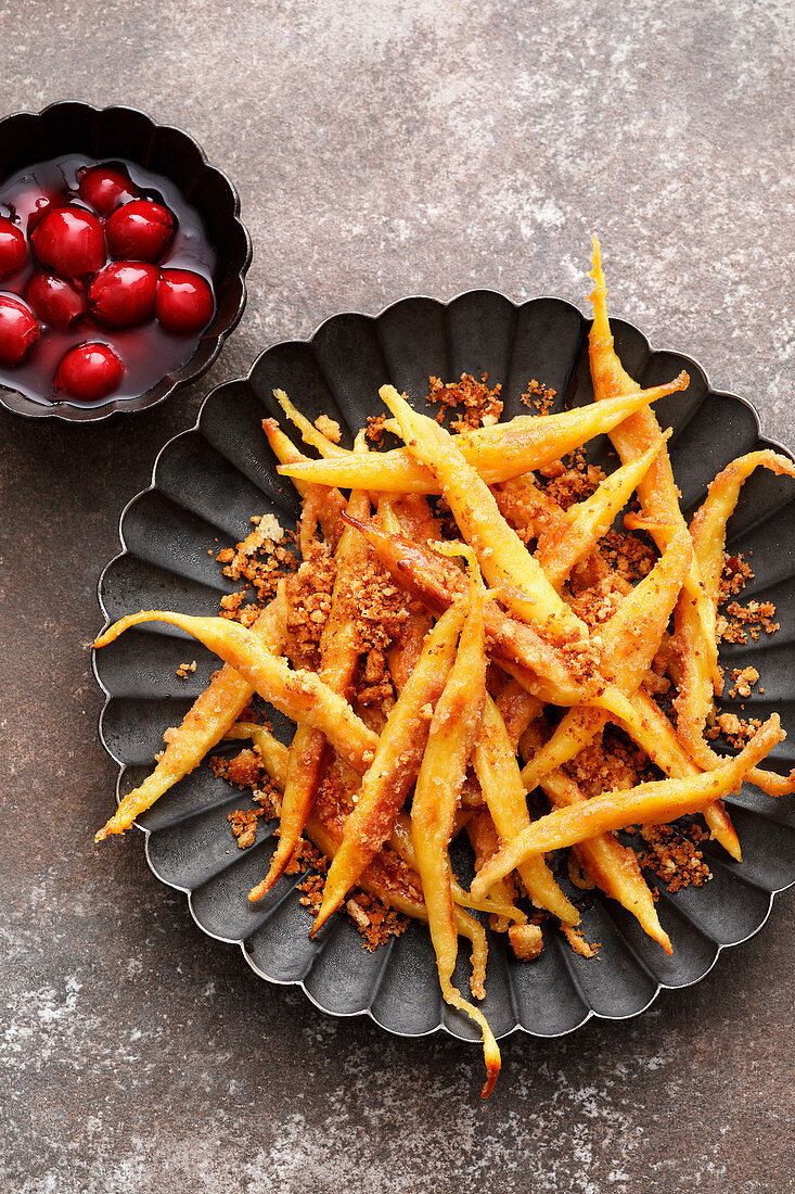 Potato orzo pasta with melba toast crumbs and cherries