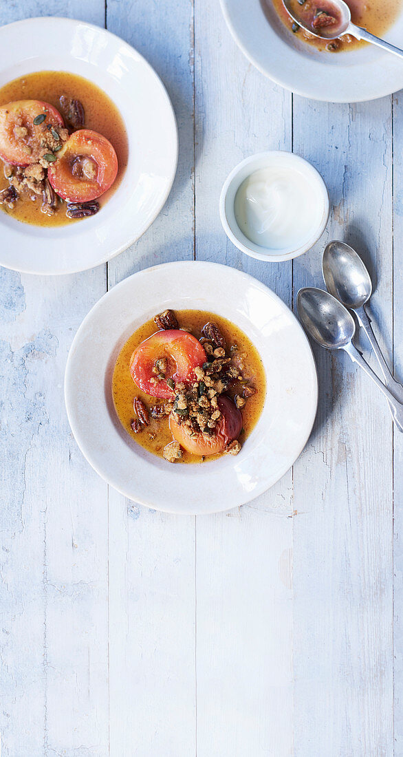 Fino and butter poached peaches with ginger pecan crunch