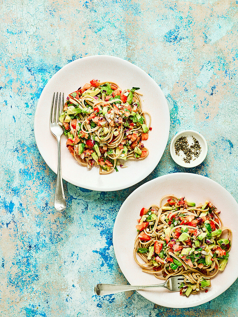 Vegan linguine with avocado, tomato and lime